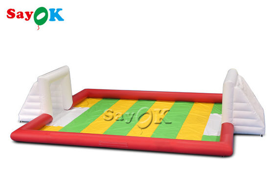 ইনফ্ল্যাটেবল পার্টি গেম 10x7m রেড পিভিসি ইনফ্ল্যাটেবল স্পোর্টস গেম কার্নিভাল ব্লো আপ সকার ফিল্ড